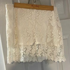 White lace mini skirt with shorts attached